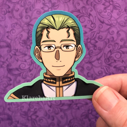 A hand holding a vinyl sticker depicting an anime character with glasses and a priest's outfit, against a purple background .